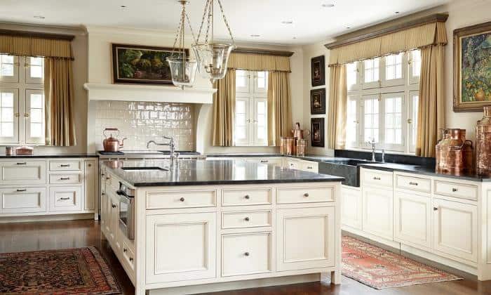 cream-cabinets-with-black-granite-countertops